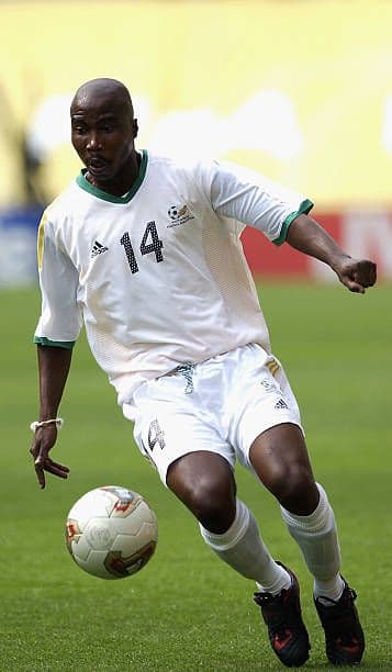 Football stadium with fans cheering during an international soccer match