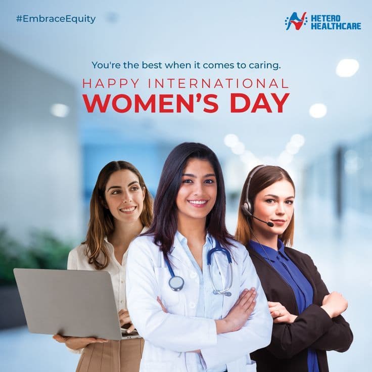 Diverse group of women celebrating International Womens Day with purple banners