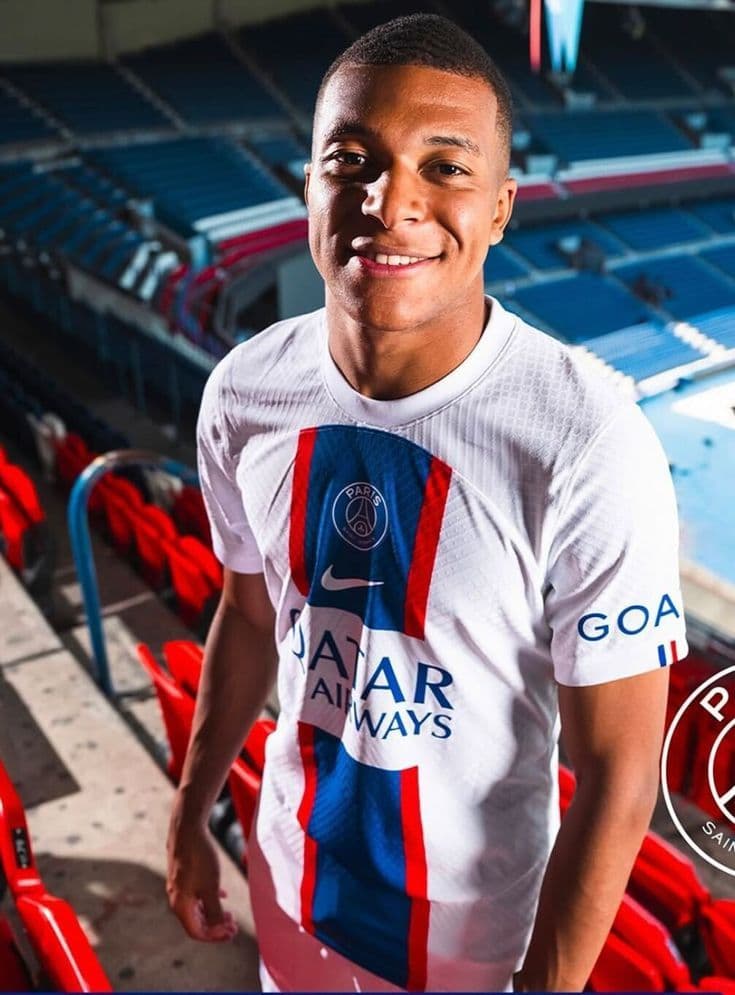 Football match in a packed French stadium at night