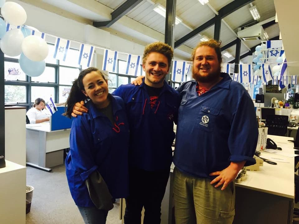 Person relaxing on a tropical beach at sunset