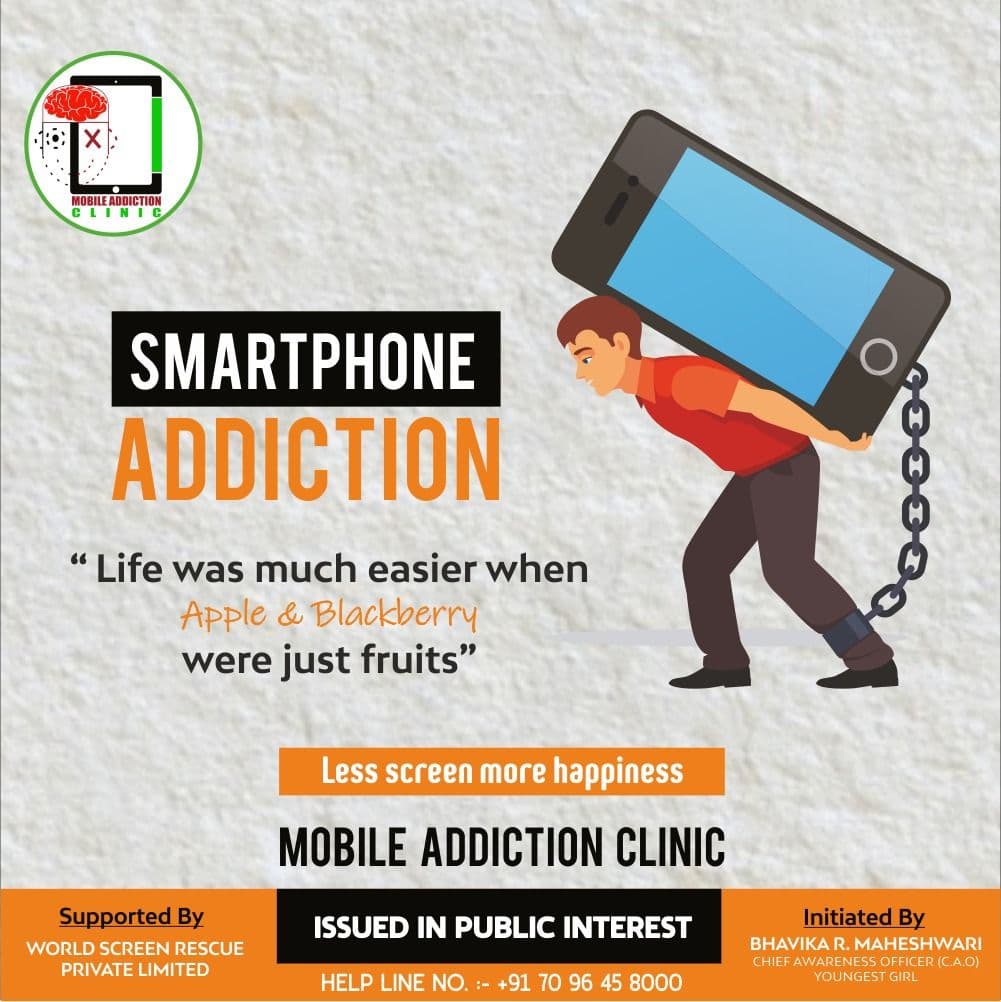 Young person staring at a glowing smartphone screen in a dark room