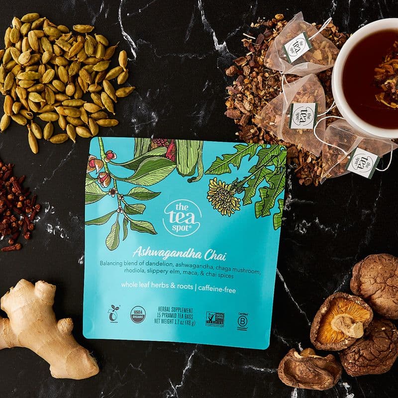 Artisan coffee cup with latte art on wooden counter