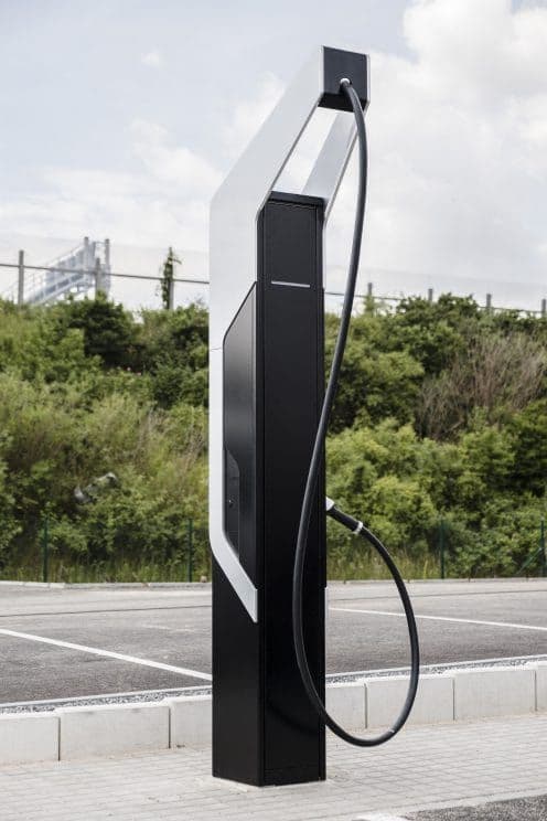 Electric vehicle charging at a modern fast-charging station