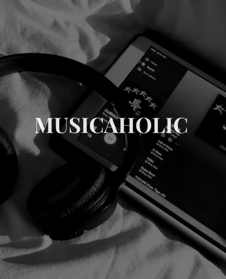 Person wearing over-ear headphones in a quiet minimalist space