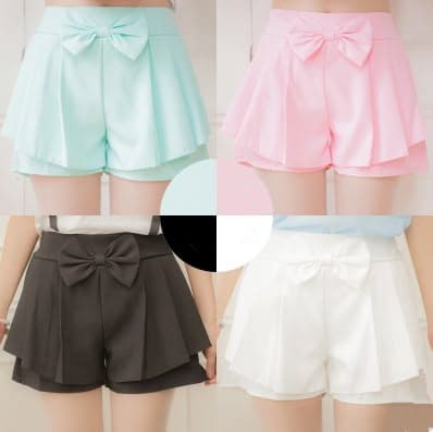 Smartphone displaying YouTube Shorts interface with colorful content