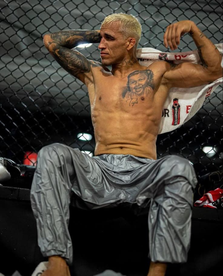 MMA octagon cage with dramatic arena lighting