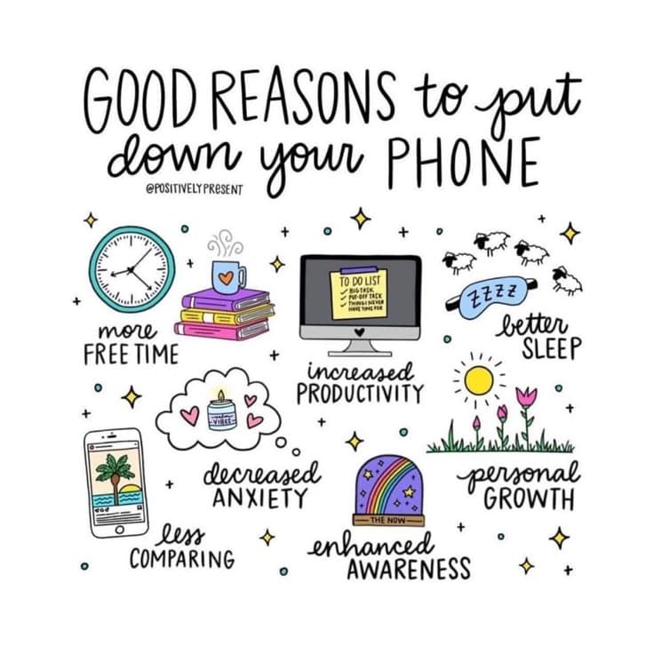 A simple light phone on a wooden table next to a coffee cup