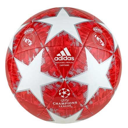 Young footballers competing in a youth match under stadium lights