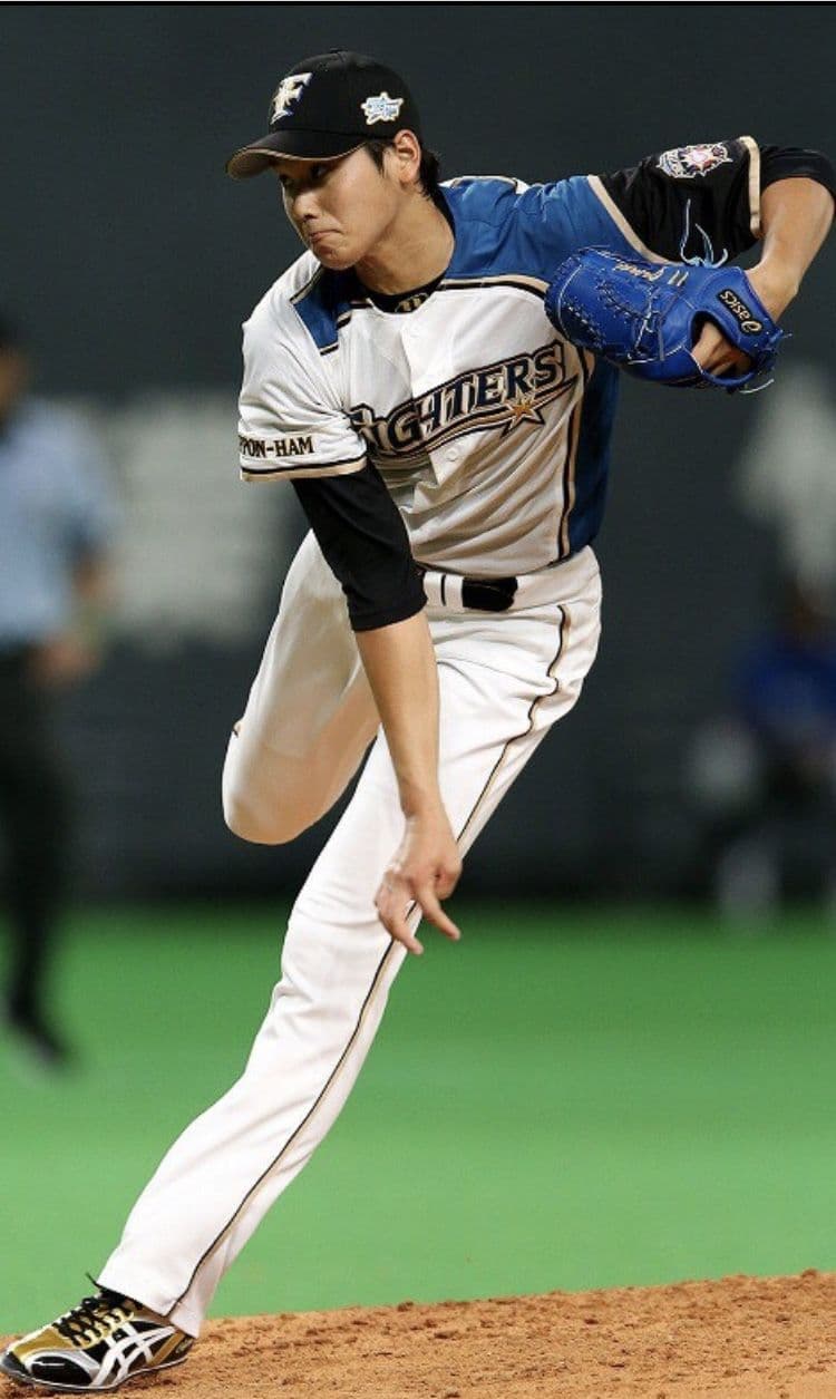Baseball player swinging a bat during a spring training game